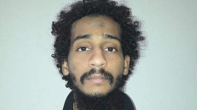 Captured British Islamic State (IS) group fighter El Shafee Elsheikh, posing for a mugshot in an undisclosed location. (AFP)