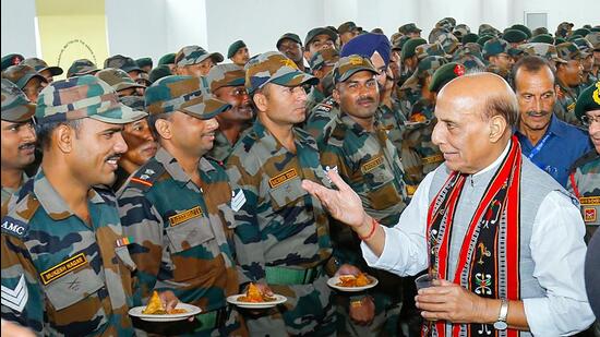 Defence minister Rajnath Singh interacts with troops of Red Shield Division and Assam Rifles during his visit to Headquarters Inspector General Assam Rifles (South) at Mantripukhri, in Imphal on Friday. (ANI) Defence minister Rajnath Singh interacts with troops of Red Shield Division and Assam Rifles during his visit to Headquarters Inspector General Assam Rifles (South) at Mantripukhri, in Imphal on Friday. (ANI)
