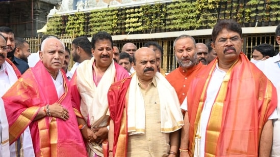 Karnataka Chief Minister Basavaraj Bommai with former CM Yediyurappa in Tirumala Tirupati.