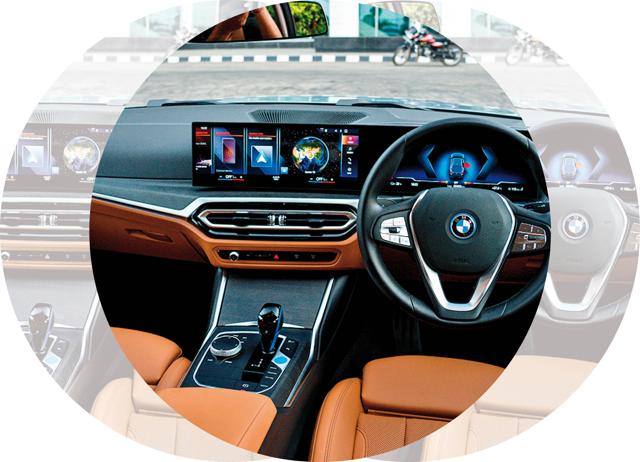 The i4 gets a new curved display, with a 14.9-inch touchscreen and 12.3-inch digital dials The i4 gets a new curved display, with a 14.9-inch touchscreen and 12.3-inch digital dials