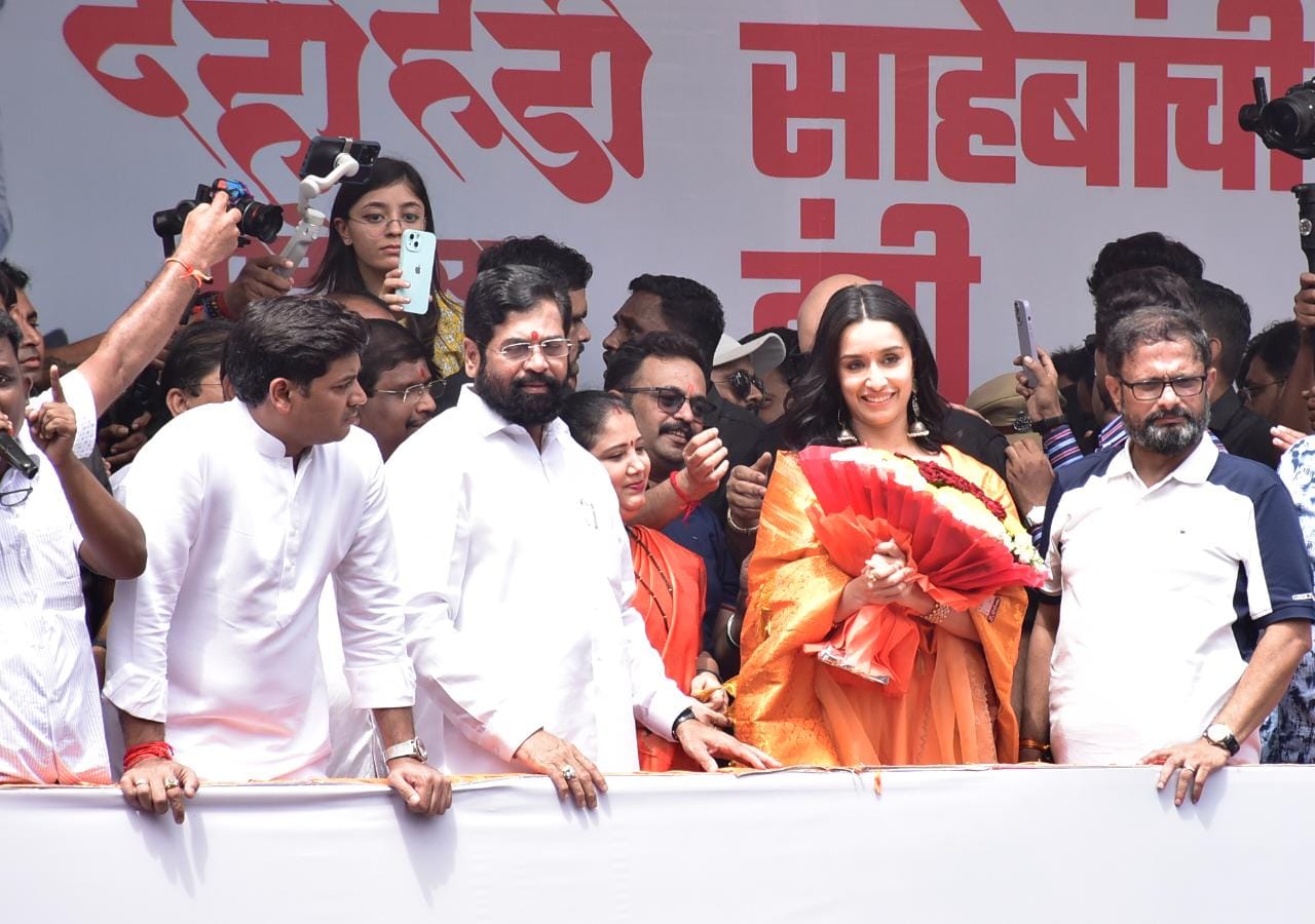 Maharashtra chief minister Eknath Shinde with Bollywood actor Shraddha Kapoor at a Dahi Handi festival in Thane on Friday.&nbsp; (Praful Gangurde/ HT Photos)