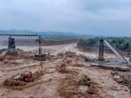 Collapsed portion of railway bridge over the Chakki river after flashfloods in Dharamshala.(PTI)