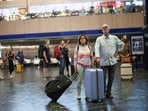 People look at departure information screens at Euston railway station, as railway workers strike over pay and terms, in London, Britain, August 20, 2022&nbsp;