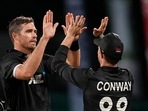 New Zealand's Tim Southee celebrates with teammate Devon Conway the dismissal of West Indies' Alzarri Joseph during the second ODI(AP) New Zealand's Tim Southee celebrates with teammate Devon Conway the dismissal of West Indies' Alzarri Joseph during the second ODI(AP)