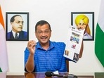 Delhi CM Arvind Kejriwal shows report about Delhi's education system from The New York Times, in New Delhi.(PTI) Delhi CM Arvind Kejriwal shows report about Delhi's education system from The New York Times, in New Delhi.(PTI)