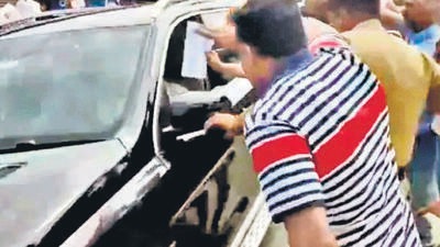 Several people, holding pictures of Savarkar and black flags, had protested against the Leader of Opposition in Karnataka assembly, in Kodagu when he was on a visit to see the rain-related damages in the district on Friday. (ANI) Several people, holding pictures of Savarkar and black flags, had protested against the Leader of Opposition in Karnataka assembly, in Kodagu when he was on a visit to see the rain-related damages in the district on Friday. (ANI)