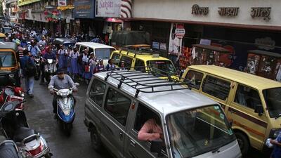 School students stuck in a traffic jam outside Huzurpaga Girls High School and Junior College on Laxmi road. (Ravindra Joshi/HT PHOTO) School students stuck in a traffic jam outside Huzurpaga Girls High School and Junior College on Laxmi road. (Ravindra Joshi/HT PHOTO)
