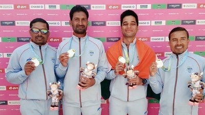 Sunil Bahadur, Navneet Singh, Chandan Kumar Singh and Dinesh Kumar pose for a photo with their Silver medals after the finals of Lawn Bowls Men's Team event at the Commonwealth Games (CWG) 2022. (Team India twitter) Sunil Bahadur, Navneet Singh, Chandan Kumar Singh and Dinesh Kumar pose for a photo with their Silver medals after the finals of Lawn Bowls Men's Team event at the Commonwealth Games (CWG) 2022. (Team India twitter)