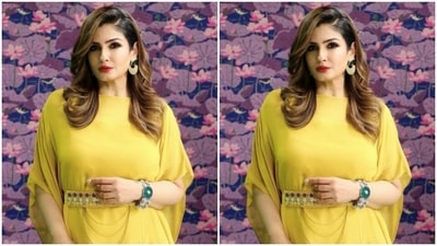 Styled by fashion stylist Richa Ranawat, Raveena wore her tresses open in soft wavy curls with a side part as she posed for the cameras. (Instagram/@officialraveenatandon)