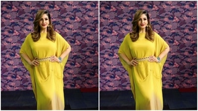 Assisted by makeup artist Shura Bhavin, Raveena decked up in smokey eyeshadow, black eyeliner, black kohl, mascara-laden eyelashes, drawn eyebrows, contoured cheeks and a shade of bright red lipstick. (Instagram/@officialraveenatandon)