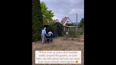 The image, taken from the Instagram video, shows the grandpa taking care of his granddaughter's kid. (Instagram/@emily.wanderland)