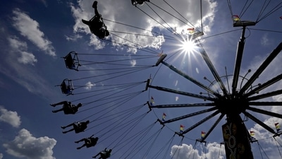 File image of people riding on a swing in a carnival. (AP) File image of people riding on a swing in a carnival. (AP)