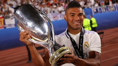 Real Madrid's Casemiro celebrates with the trophy after winning the European Super Cup (REUTERS)