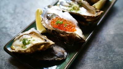 Coffin Bay Oysters: These enormous oysters hail from the pristine waters of South Australia’s Coffin Bay. They are sold at a whopping amount of $100 each. They are eaten as they are or with some lime juice. (Unsplash) Coffin Bay Oysters: These enormous oysters hail from the pristine waters of South Australia’s Coffin Bay. They are sold at a whopping amount of $100 each. They are eaten as they are or with some lime juice. (Unsplash)