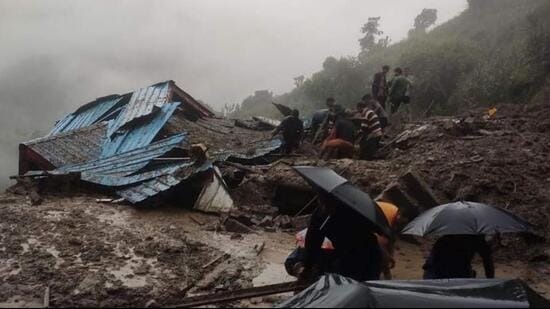 Eight members of a family were reported buried under the debris of their house after a landslide at Kasan in Gohar sub division in Mandi district on Saturday. (HT Photo)