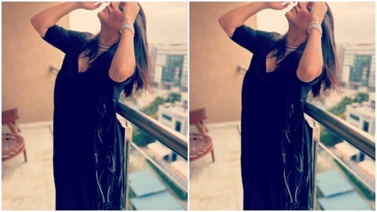 Neha decked up in a black satin long dress that featured a plunging neckline and long sleeves.(Instagram/@nehadhupia)