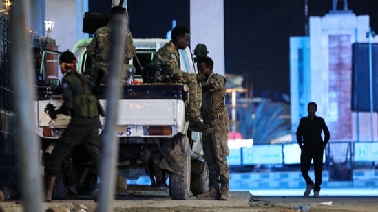 Security forces patrol near the Hayat Hotel after an attack by Al-Shabaab fighters in Mogadishu on August 20, 2022.(AFP)