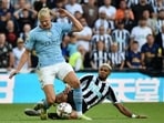 Newcastle's Joelinton, right, challenges Manchester City's Erling Haaland during the English Premier League match Newcastle's Joelinton, right, challenges Manchester City's Erling Haaland during the English Premier League match