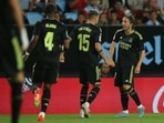 Real Madrid's Luka Modric celebrates scoring their second goal with Federico Valverde and David Alaba