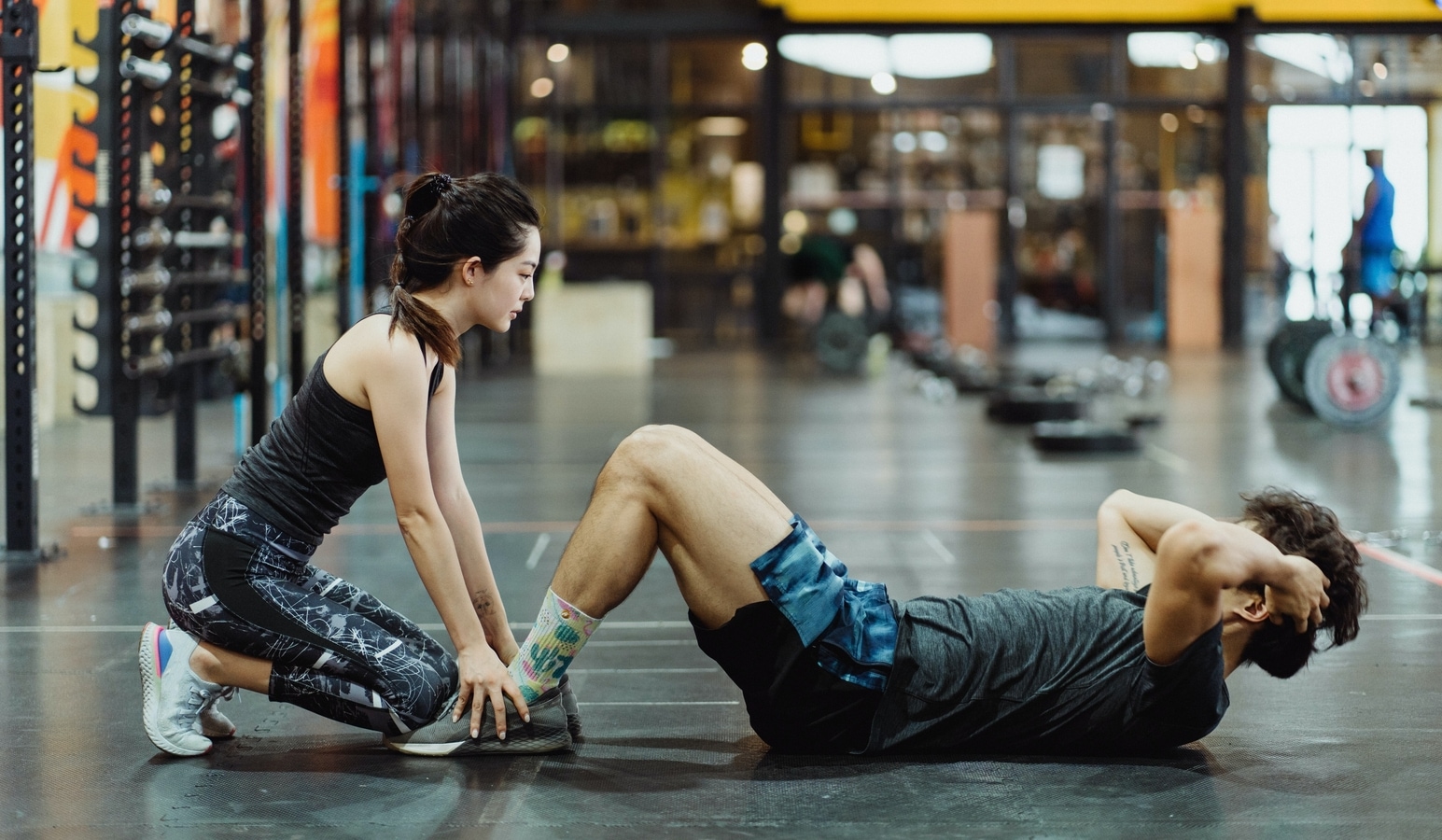 Premium Photo  Pilates trainer exercises on a pilates barrel