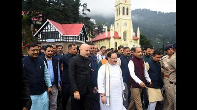 BJP national chief JP Nadda along with HP CM Jai Ram Thakur and actor Anupam Kher on The Ridge on Sunday. (Deepak Sansta/HT) BJP national chief JP Nadda along with HP CM Jai Ram Thakur and actor Anupam Kher on The Ridge on Sunday. (Deepak Sansta/HT)