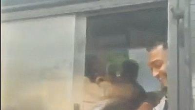 The followers of the accused, who is locked in Adharwadi jail, waited till his hearing was over and then handed over the cake to Zha from the window of the police van (HT Photo) The followers of the accused, who is locked in Adharwadi jail, waited till his hearing was over and then handed over the cake to Zha from the window of the police van (HT Photo)