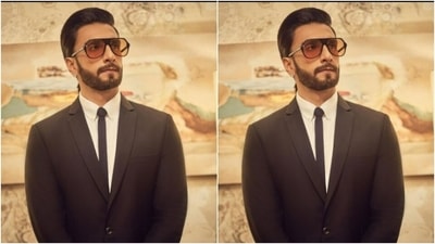 Ranveer decked up in a classic white shirt and added a sleek blue tie to his look. (Instagram/@ranveersingh)