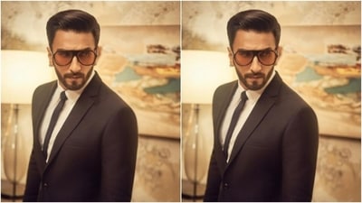 Ranveer layered his look for the day in a black blazer and a pair of formal black trousers. (Instagram/@ranveersingh)