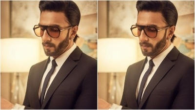 In diamond ear studs and tinted shades, Ranveer further accessorised his look for the day. (Instagram/@ranveersingh)