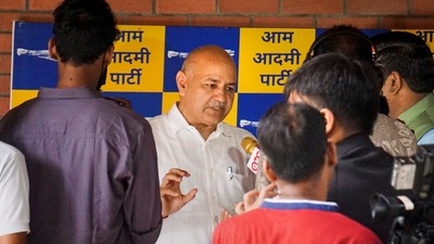 Delhi Dy CM Manish Sisodia talks to the media regarding the CBI look-out notice issued against him, at his residence in New Delhi, (PTI) Delhi Dy CM Manish Sisodia talks to the media regarding the CBI look-out notice issued against him, at his residence in New Delhi, (PTI)