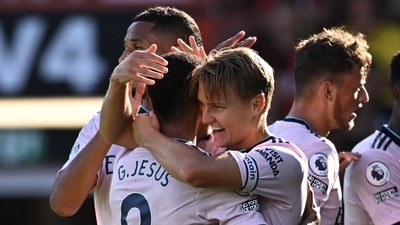 Arsenal's Martin Odegaard celebrates scoring their second goal with Gabriel Jesus (REUTERS)