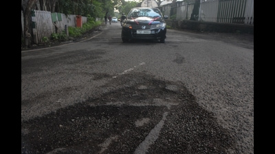 Potholes near Race course, Camp. (Shankar Narayan/HT PHOTO)