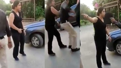 The video showed the woman hurling expletives at security guards and holding one of them by his uniform. (Source: Video grabs) The video showed the woman hurling expletives at security guards and holding one of them by his uniform. (Source: Video grabs)