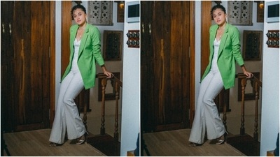 Taapsee turned boss babe in this white bustier top and flared pants set teamed with an oversized parrot green blazer. Her signature curly hair tied in a messy bun and minimal makeup acted as a cherry on the cake. Which outfit do you like the most? (Instagram/@dev213) Taapsee turned boss babe in this white bustier top and flared pants set teamed with an oversized parrot green blazer. Her signature curly hair tied in a messy bun and minimal makeup acted as a cherry on the cake. Which outfit do you like the most? (Instagram/@dev213)