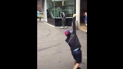 The video shows a little boy throwing a cricket ball at a statue. (Twitter/@TheBarmyArmy) The video shows a little boy throwing a cricket ball at a statue. (Twitter/@TheBarmyArmy)