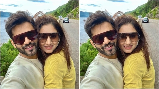 The first picture shows Rahul and Disha smiling brightly while taking a roadside selfie with a scenic backdrop. The couple wore broad futuristic shades and hugged each other for the click. They look so adorable here.(Instagram)