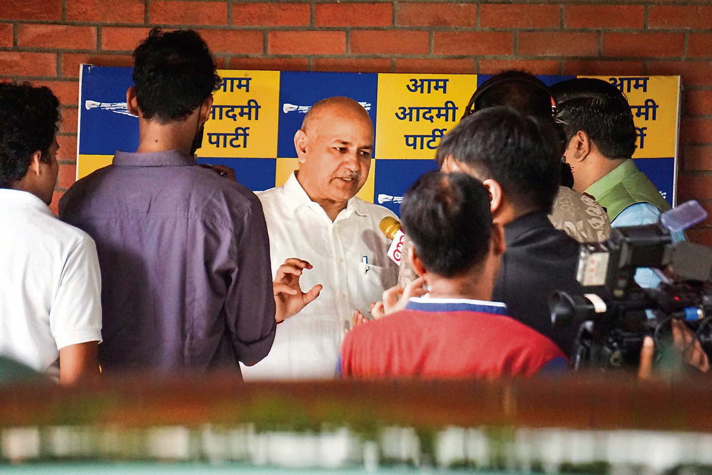 Delhi dy CM Manish Sisodia talks to reporters in New Delhi on Sunday. (PTI)