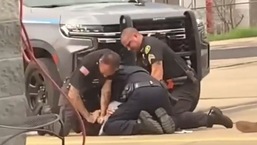 Law enforcement officers seen beating up a man in Mulberry, Crawford County, state of Arkansas in US.