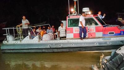 Police personnel conduct a rescue operation after several people were washed away by the flooded Mahanadi river in Odisha. (PTI Photo) Police personnel conduct a rescue operation after several people were washed away by the flooded Mahanadi river in Odisha. (PTI Photo)