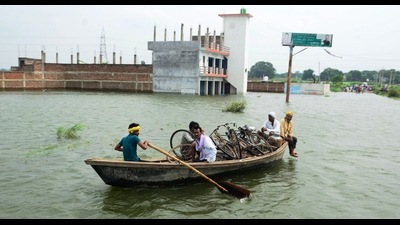 Boats plying in flood affected areas of the district. (HT photo) Boats plying in flood affected areas of the district. (HT photo)