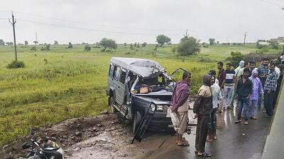 Locals gather near the wreckage of the SUV after its collision with a truck in Ujjain on Monday. (PTI) Locals gather near the wreckage of the SUV after its collision with a truck in Ujjain on Monday. (PTI)