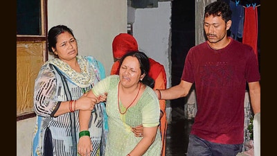 Victim Pooja’s sister in an inconsolable state after the bodies were discovered IN the family’s rented accommodation in Bhagwanpura in Kishangarh village on Monday. (SANT ARORA/HT) Victim Pooja’s sister in an inconsolable state after the bodies were discovered IN the family’s rented accommodation in Bhagwanpura in Kishangarh village on Monday. (SANT ARORA/HT)