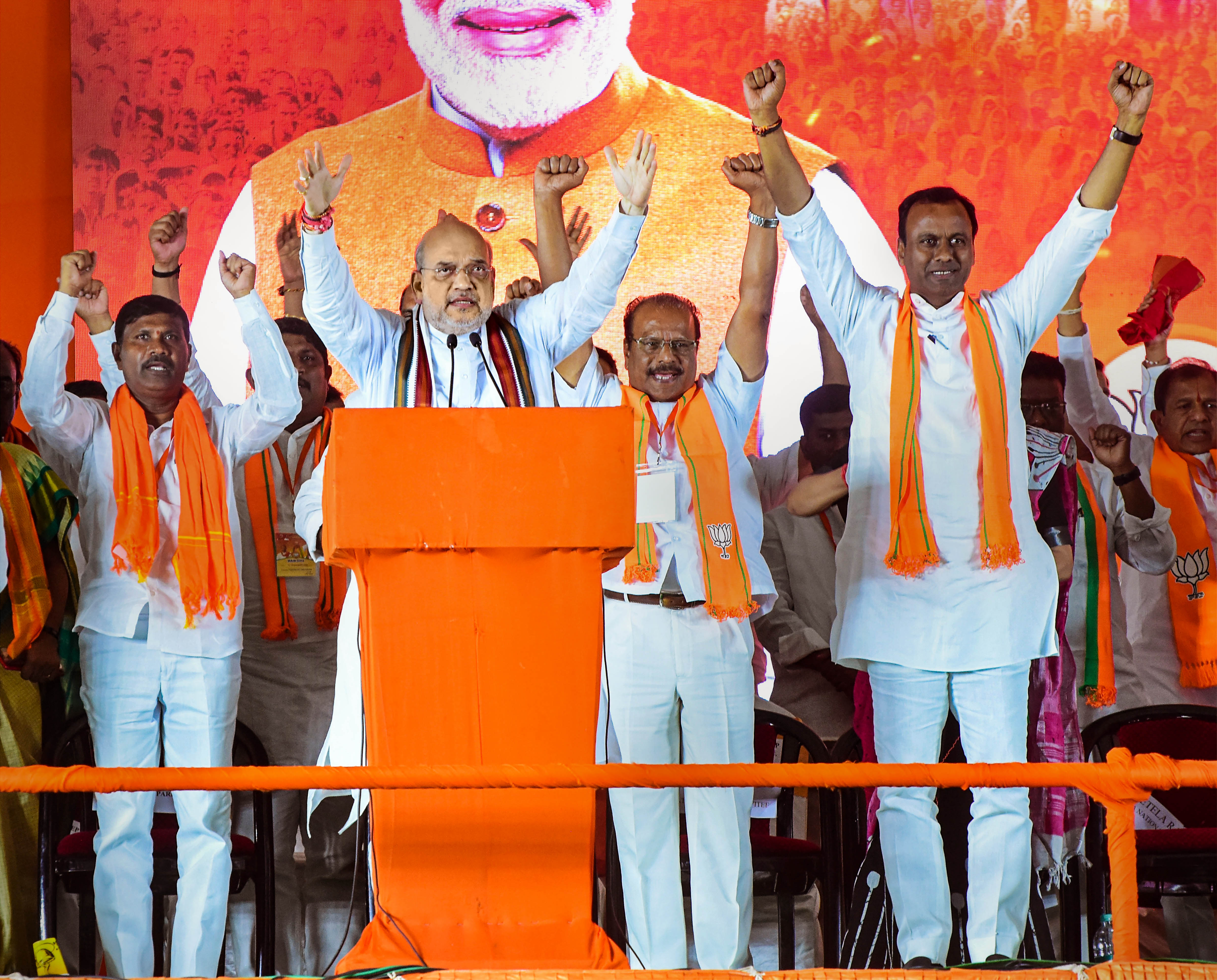 Amit Shah addresses a public meeting at Munugode in Nalgonda district. (PTI) Amit Shah addresses a public meeting at Munugode in Nalgonda district. (PTI)