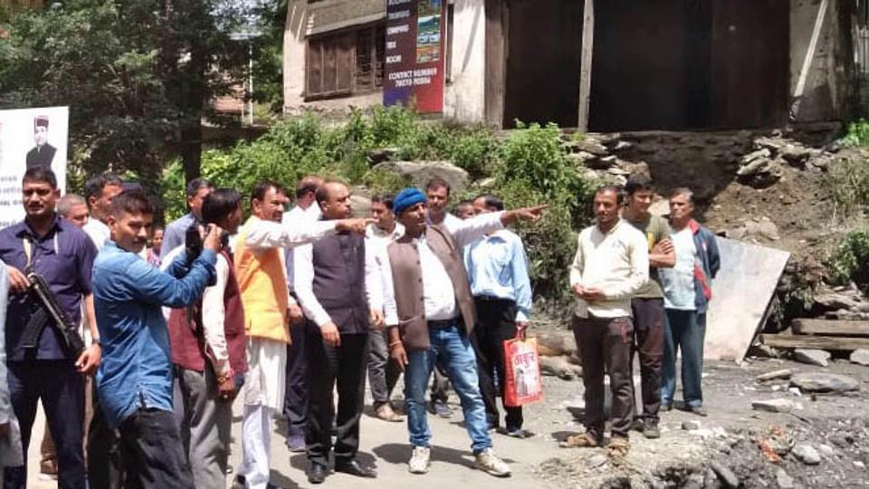 Expressing condolences to the family of the deceased, he handed them ₹12 lakh as assistance. He said that the repairs to damaged foot paths, bridges, and roads will be completed soon and directions had been given to the departments concerned in this regard. (Birbal Sharma /HT) Expressing condolences to the family of the deceased, he handed them ₹12 lakh as assistance. He said that the repairs to damaged foot paths, bridges, and roads will be completed soon and directions had been given to the departments concerned in this regard. (Birbal Sharma /HT)
