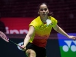 Saina Nehwal of India plays a return during a badminton game of the women's singles against Cheung Ngan Yi of Hong Kong(AP) Saina Nehwal of India plays a return during a badminton game of the women's singles against Cheung Ngan Yi of Hong Kong(AP)
