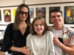 Angelina Jolie, her daughter Vivienne Jolie-Pitt and Anthony Norman. Angelina Jolie, her daughter Vivienne Jolie-Pitt and Anthony Norman.