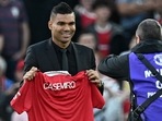 Casemiro is photographed with a United shirt as he is introduced to supporters ahead of the Premier League match between Manchester United and Liverpool at Old Trafford. Casemiro is photographed with a United shirt as he is introduced to supporters ahead of the Premier League match between Manchester United and Liverpool at Old Trafford.