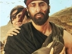Ranbir Kapoor and Vaani Kapoor holding a ‘baby’ in stills from Shamshera. Ranbir Kapoor and Vaani Kapoor holding a ‘baby’ in stills from Shamshera.