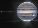 This image provided by NASA shows a false color composite image of Jupiter obtained by the James Webb Space Telescope on July 27, 2022. The planet’s rings and some of its small satellites are visible along with background galaxies. (NASA via AP)(AP)
