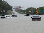 Stalled cars sit abandoned on the flooded Interstate 635 Service Road on Monday, Aug. 22, 2022, in Mesquite, Texas.(AP) Stalled cars sit abandoned on the flooded Interstate 635 Service Road on Monday, Aug. 22, 2022, in Mesquite, Texas.(AP)